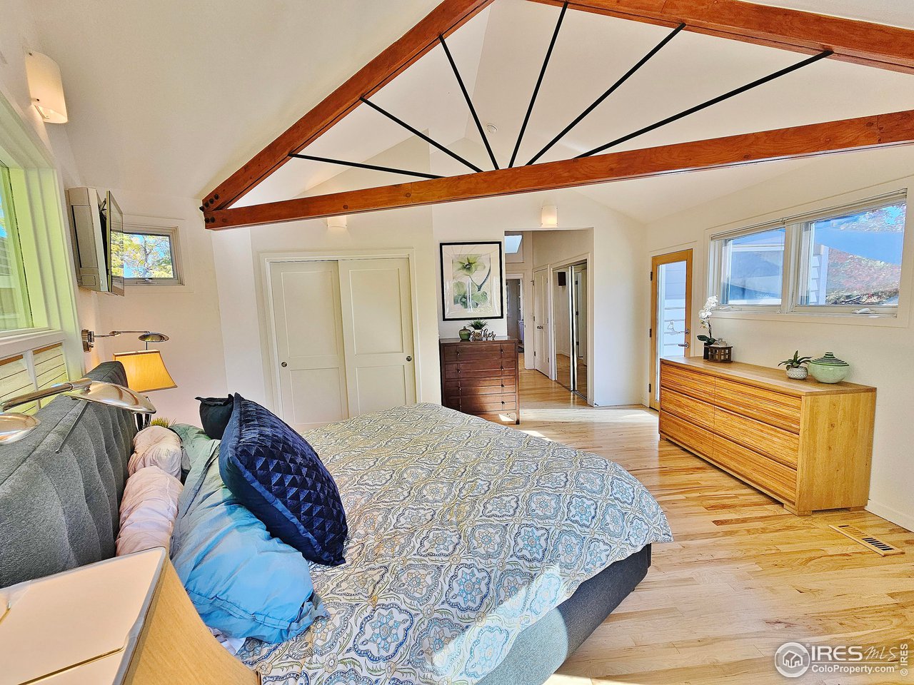 516 Valley View Drive Boulder, CO 80304 - Photo 21 of 35 Vaulted Primary BR with Custom Beams and Iron Details