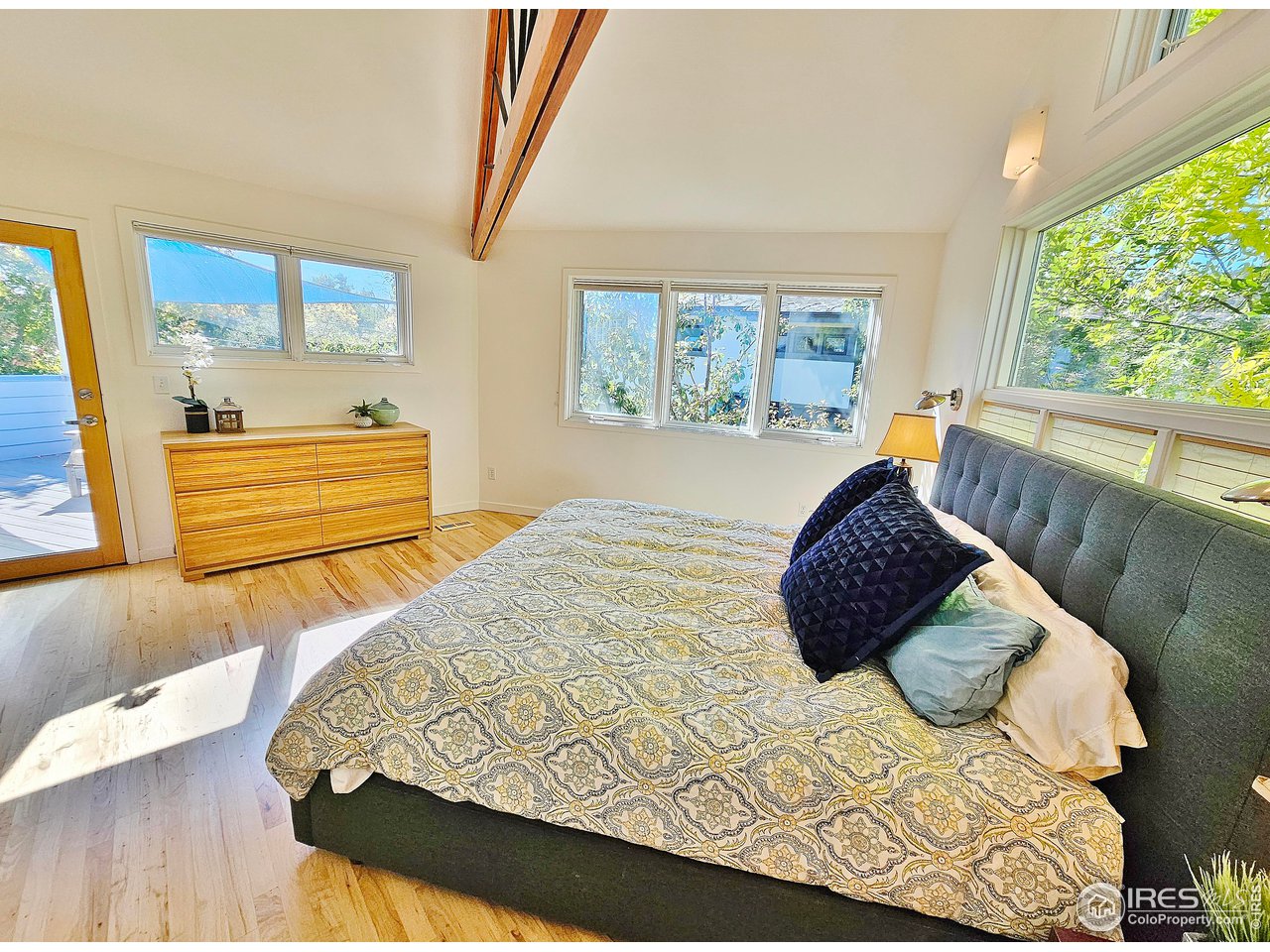 516 Valley View Drive Boulder, CO 80304 - Photo 22 of 35 Vaulted Primary BR with Balcony/Deck Access & Mountain Views