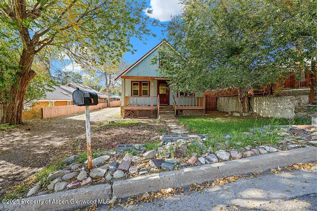 a backyard of a house with seating space
