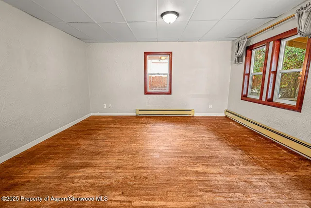 an empty room with windows