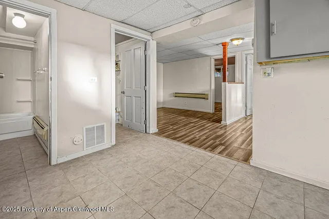 a view of a hallway with closet area