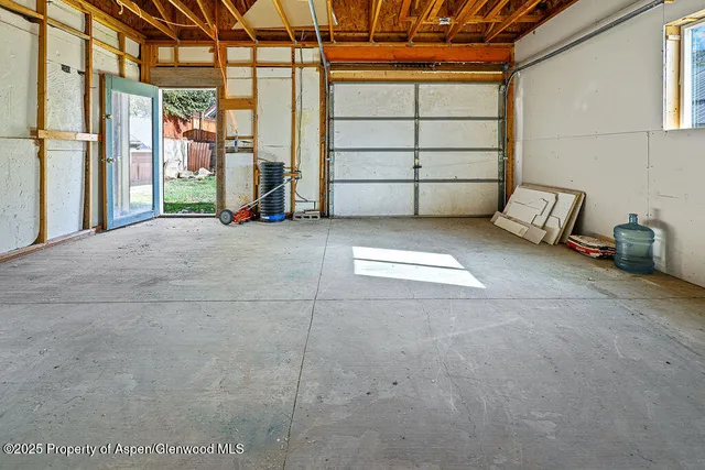 a view of a garage with storage