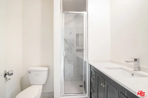 a view of small space with racks on the wall