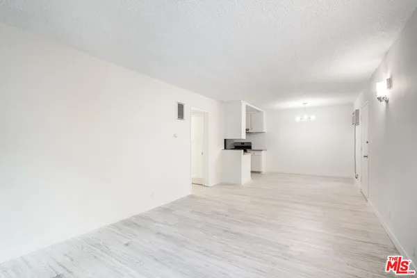 a view of kitchen with wooden floor