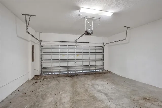 a view of a room with a wooden floor
