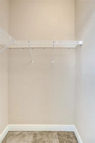 a view of small space with racks on the wall