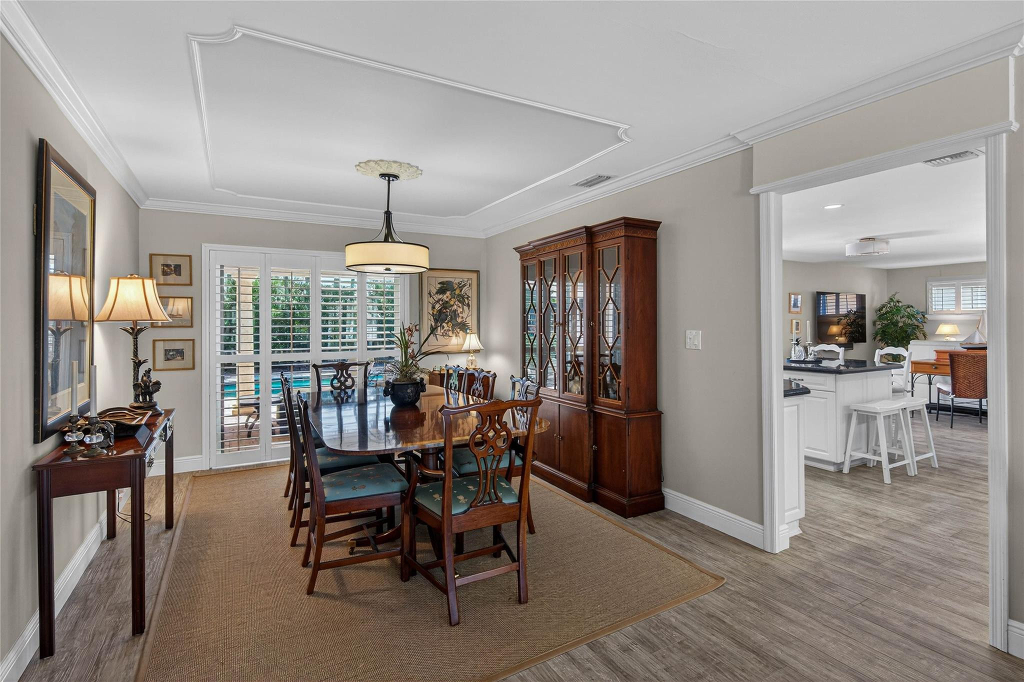 2600 Northeast 46th Street Lighthouse Point, FL 33064 - Photo 13 of 59 a view of a dining room with furniture window and wooden floor