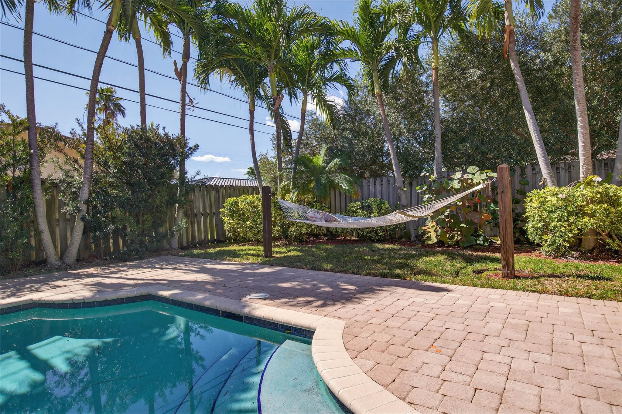 2600 Northeast 46th Street Lighthouse Point, FL 33064 - Photo 42 of 59 a view of a backyard