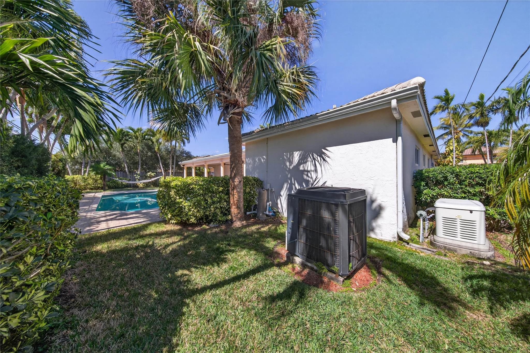 2600 Northeast 46th Street Lighthouse Point, FL 33064 - Photo 47 of 59 a view of a small yard in front of a house