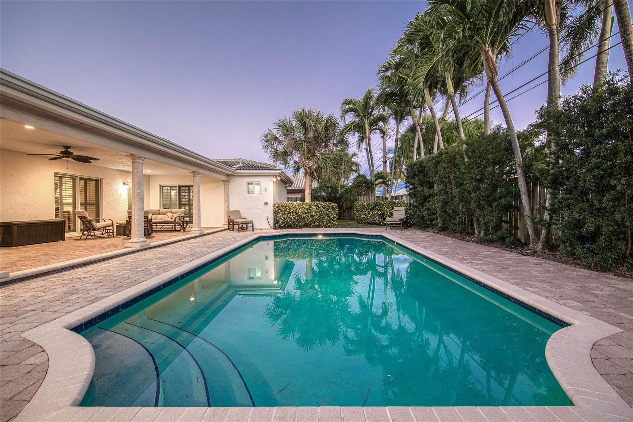 2600 Northeast 46th Street Lighthouse Point, FL 33064 - Photo 48 of 59 a swimming pool with yard