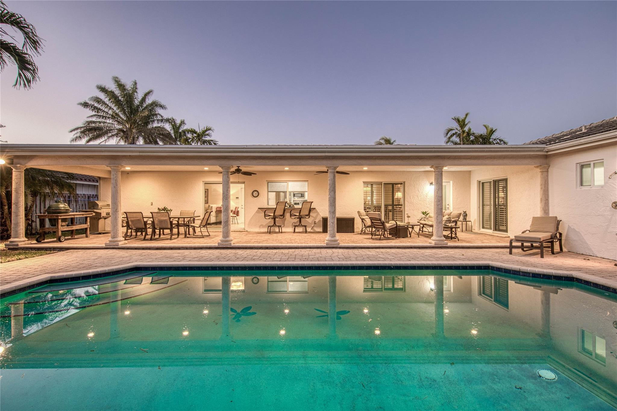 2600 Northeast 46th Street Lighthouse Point, FL 33064 - Photo 51 of 59 a swimming pool view with a garden space