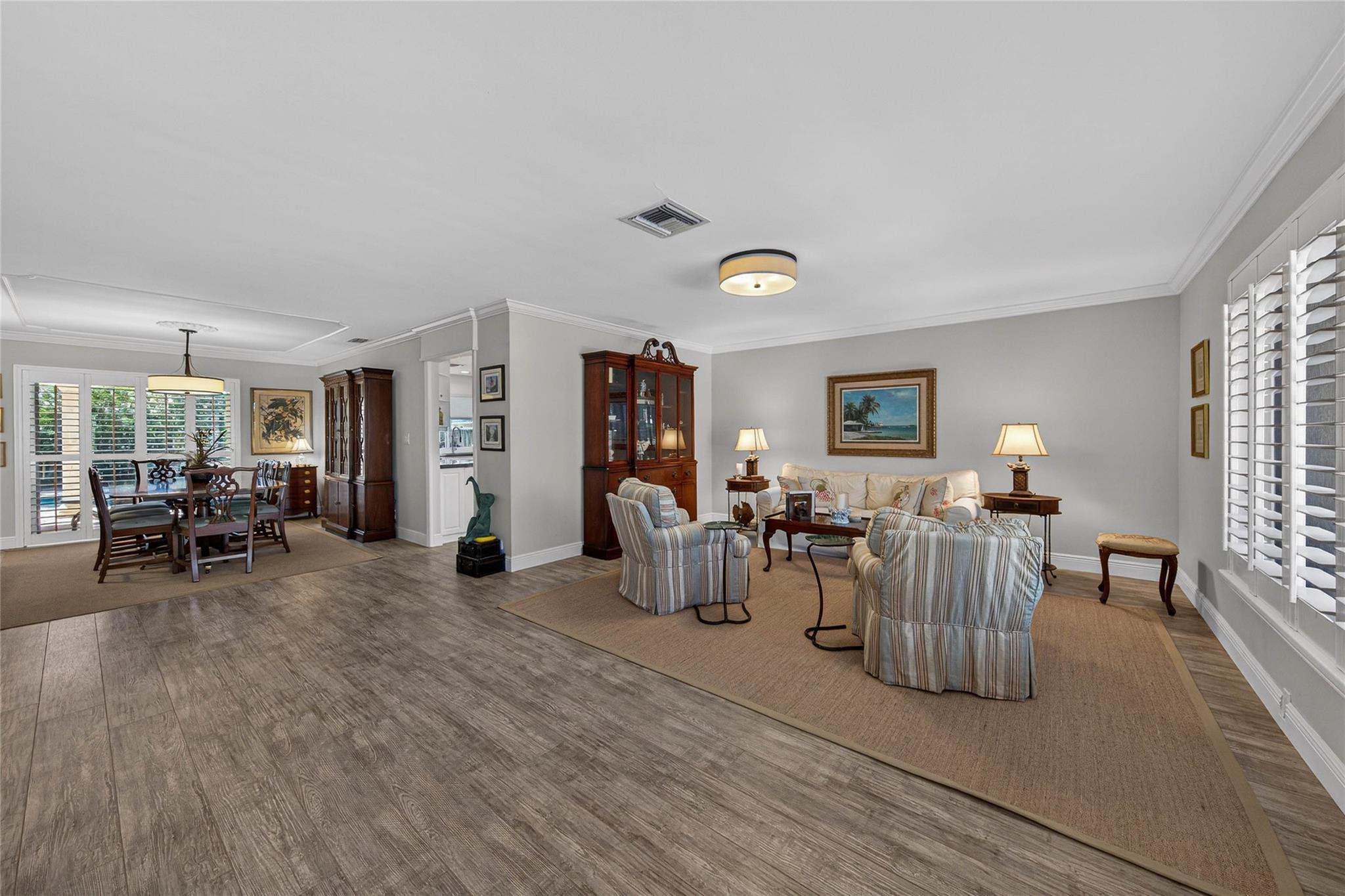 2600 Northeast 46th Street Lighthouse Point, FL 33064 - Photo 6 of 59 a living room with furniture and a wooden floor