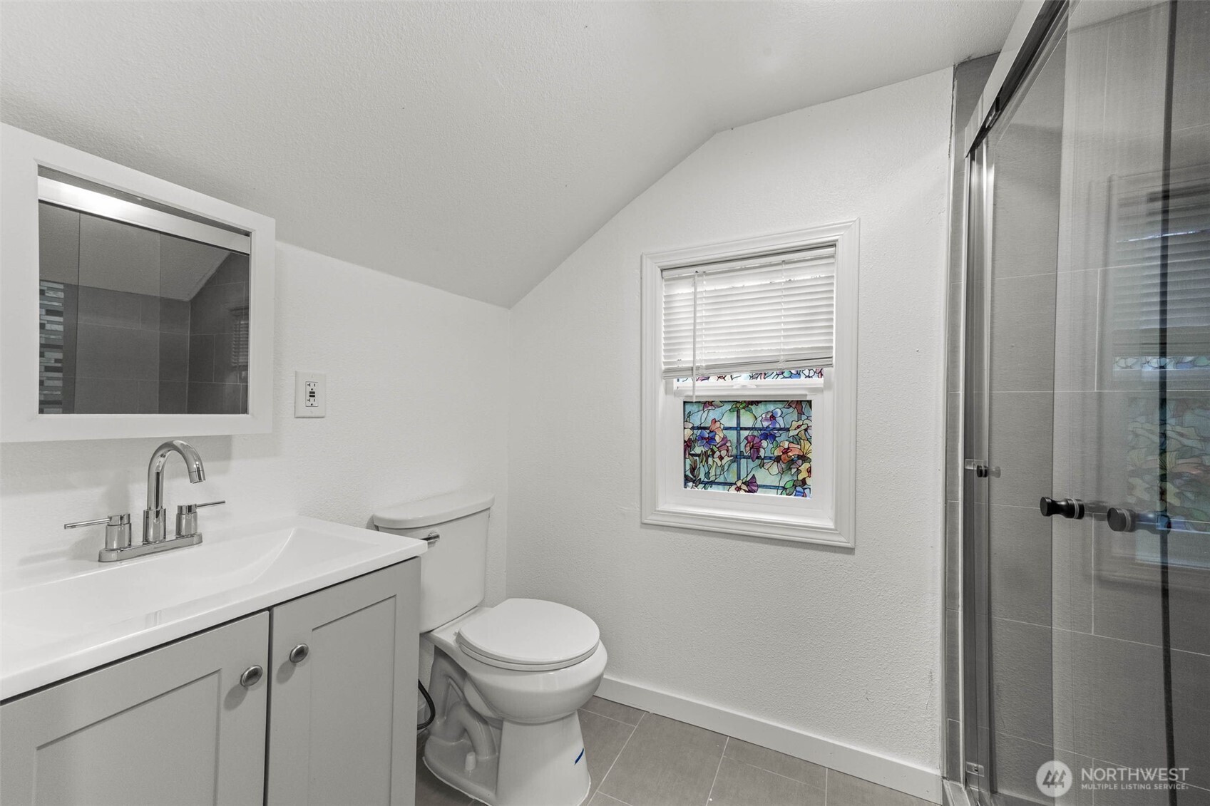 172 South Bank Road Elma, WA 98541 - Photo 27 of 40 a bathroom with a toilet sink and mirror