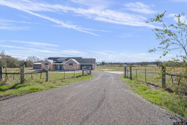 a view of an outdoor space and a yard