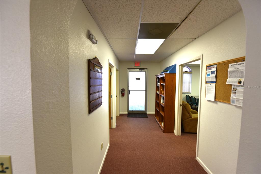 630 Union Street Dunedin, FL 34698 - Photo 15 of 37 a view of a hallway with furniture and entryway