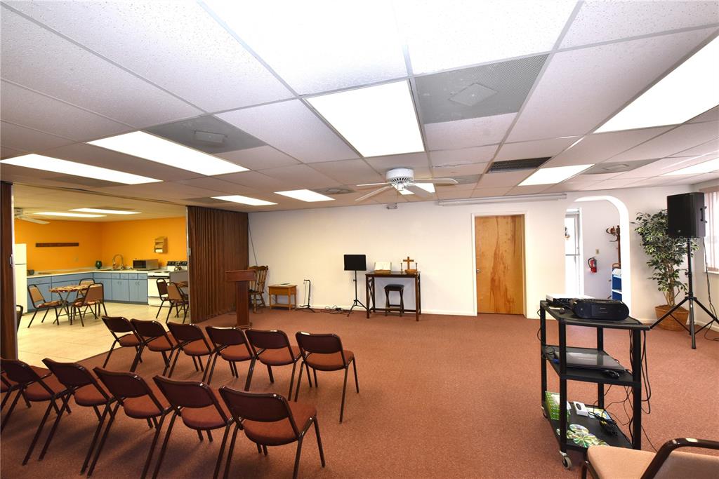 630 Union Street Dunedin, FL 34698 - Photo 16 of 37 a view of a dining room with furniture window and outside view