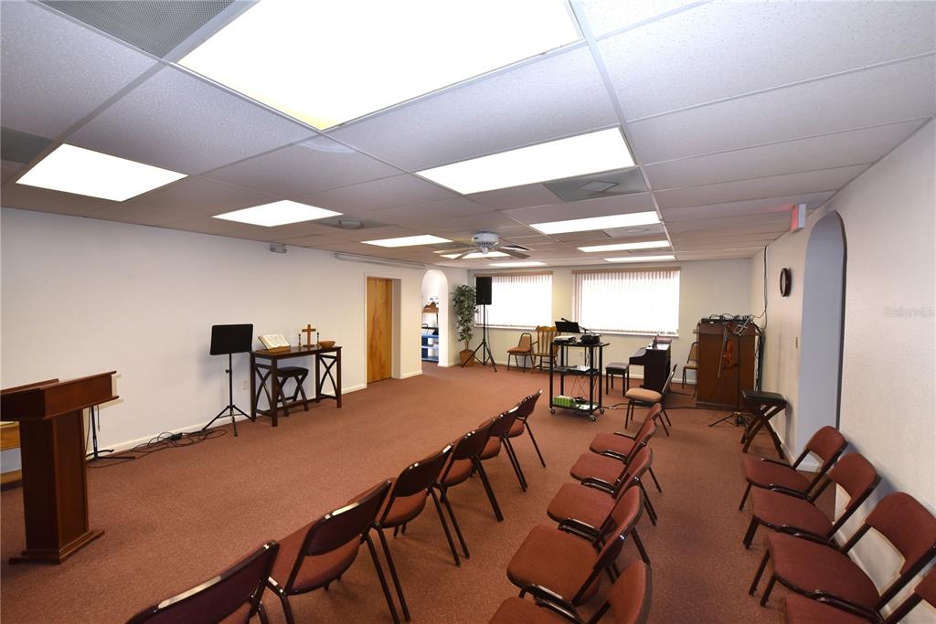 630 Union Street Dunedin, FL 34698 - Photo 19 of 37 a view of a dining room with furniture