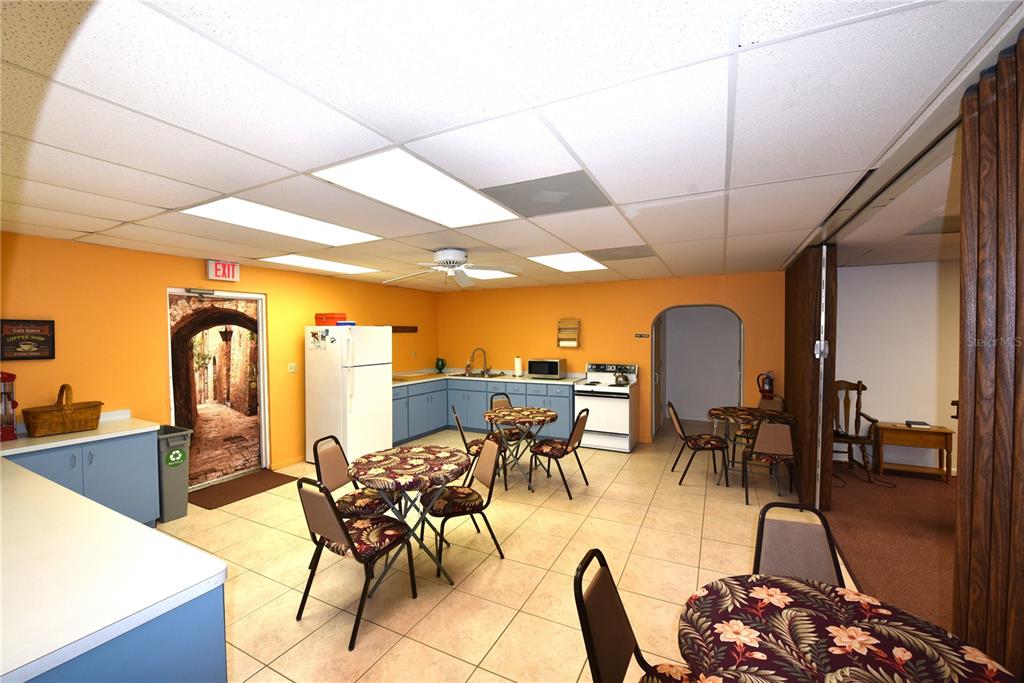 630 Union Street Dunedin, FL 34698 - Photo 23 of 37 a view of a dining room with furniture