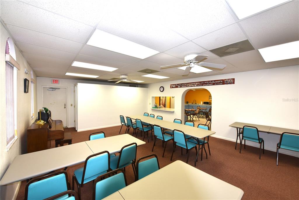 630 Union Street Dunedin, FL 34698 - Photo 27 of 37 a view of a dining room with furniture