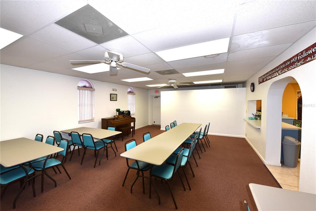 630 Union Street Dunedin, FL 34698 - Photo 29 of 37 a view of a dining room with furniture