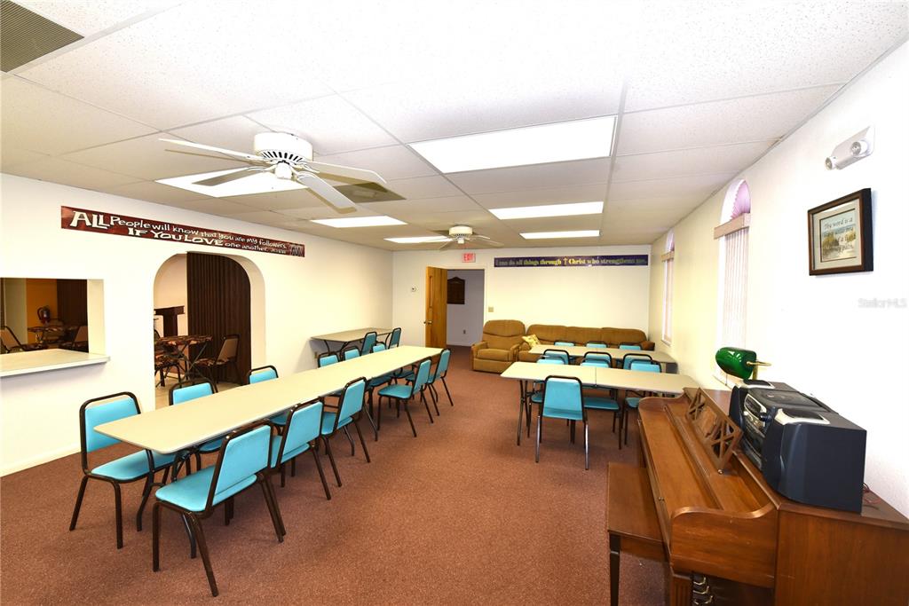 630 Union Street Dunedin, FL 34698 - Photo 30 of 37 a view of a dining room with furniture