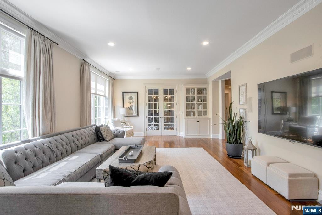19 Autumn Terrace Alpine, NJ 07620 - Photo 11 of 33 a living room with furniture and a large window