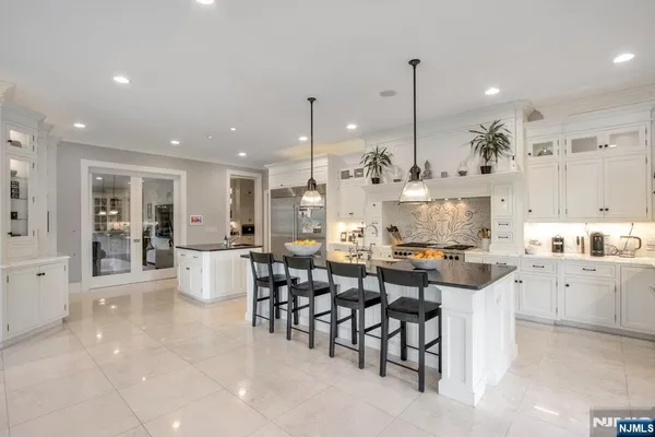 a large kitchen with lots of counter space and appliances