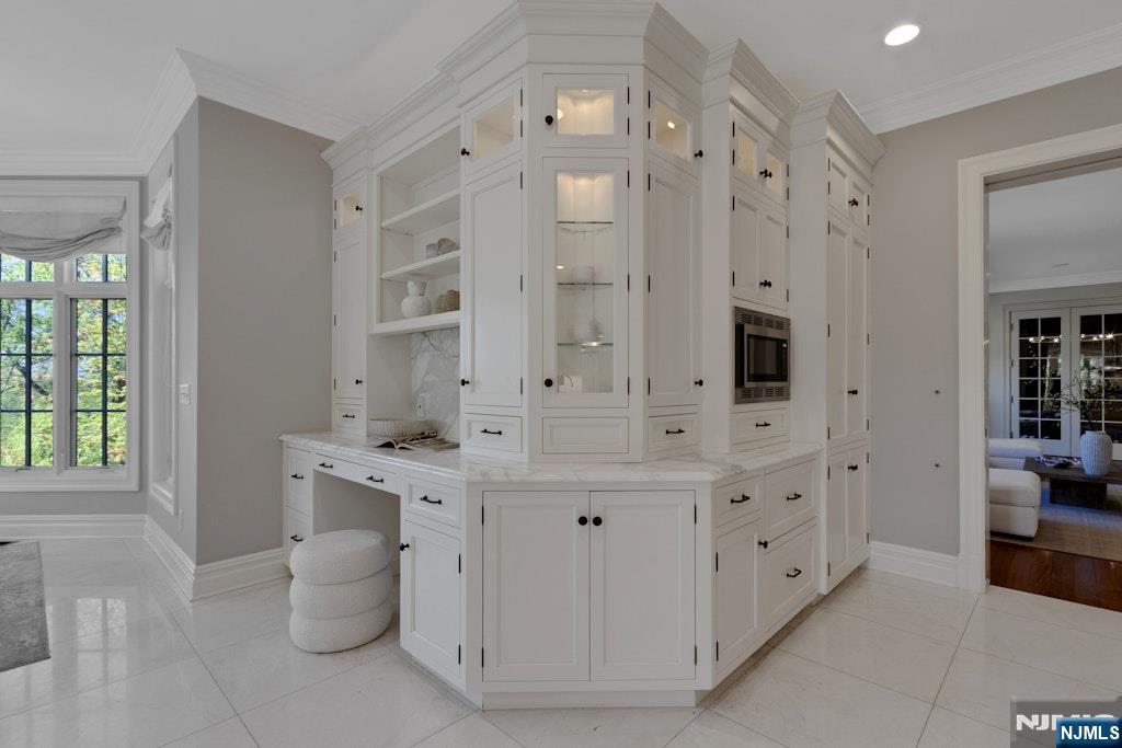 19 Autumn Terrace Alpine, NJ 07620 - Photo 21 of 45 a spacious bathroom with a double vanity sink a mirror and a bathtub