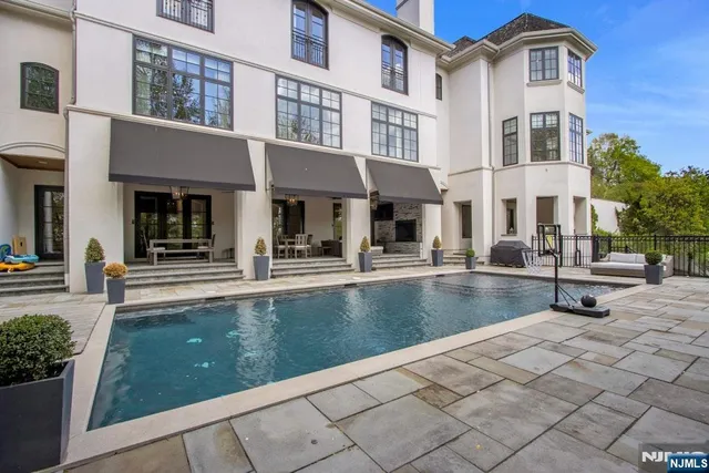 a view of a building with a swimming pool