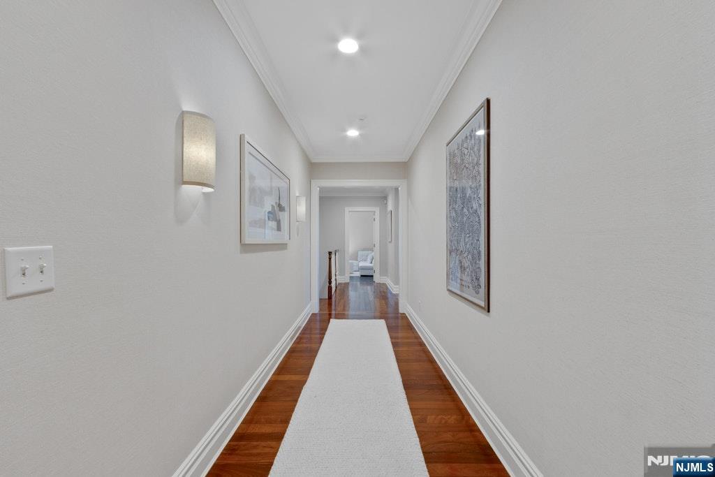 19 Autumn Terrace Alpine, NJ 07620 - Photo 26 of 45 a view of a hallway with wooden floor and a carpet