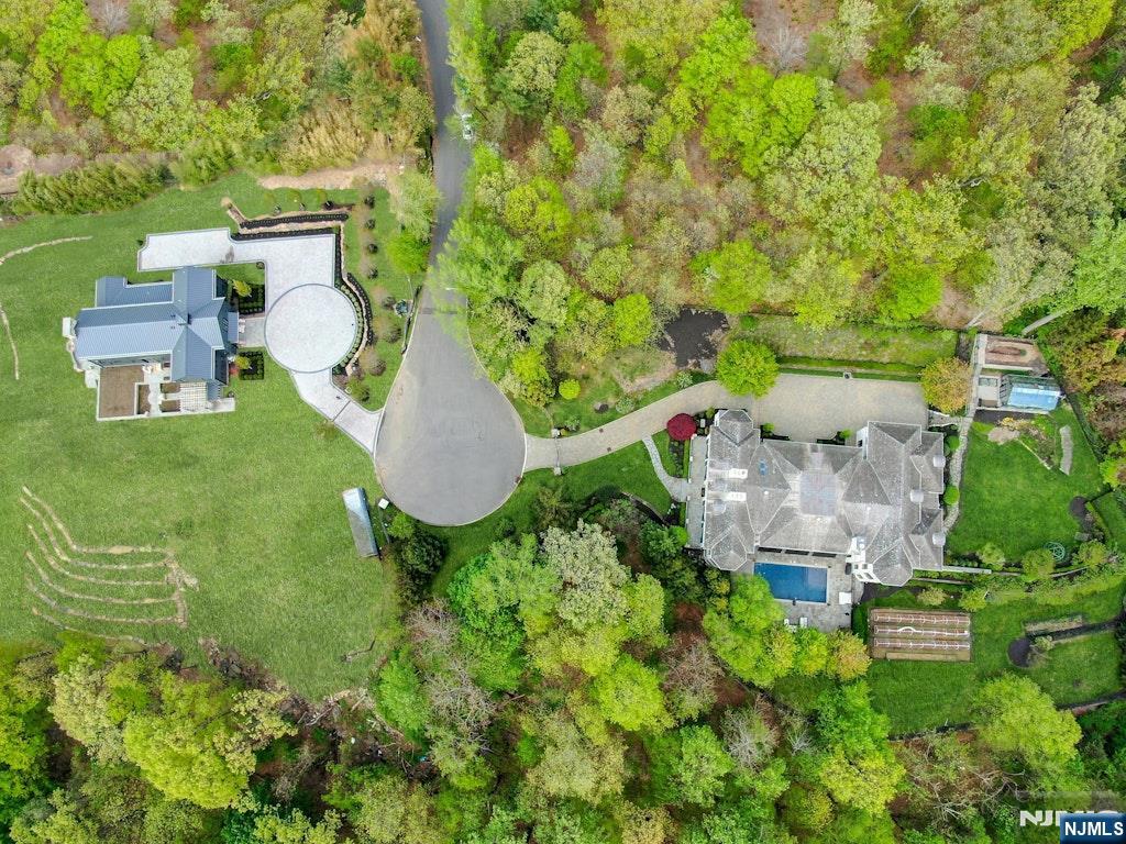 19 Autumn Terrace Alpine, NJ 07620 - Photo 44 of 45 an aerial view of a house with a garden