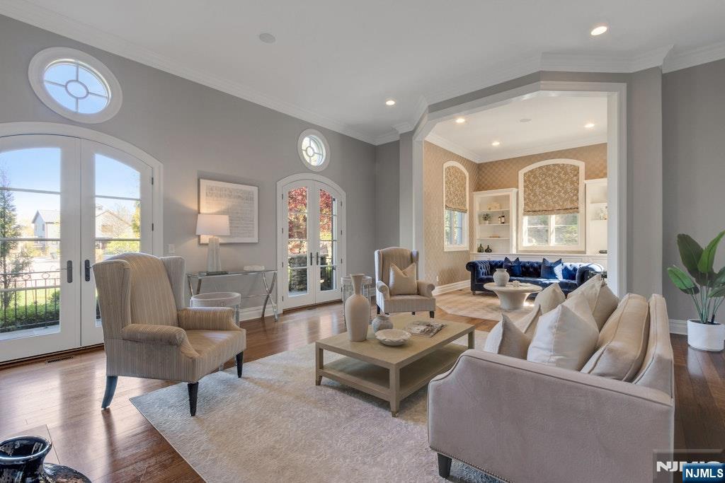 19 Autumn Terrace Alpine, NJ 07620 - Photo 8 of 45 a living room with furniture and a large window