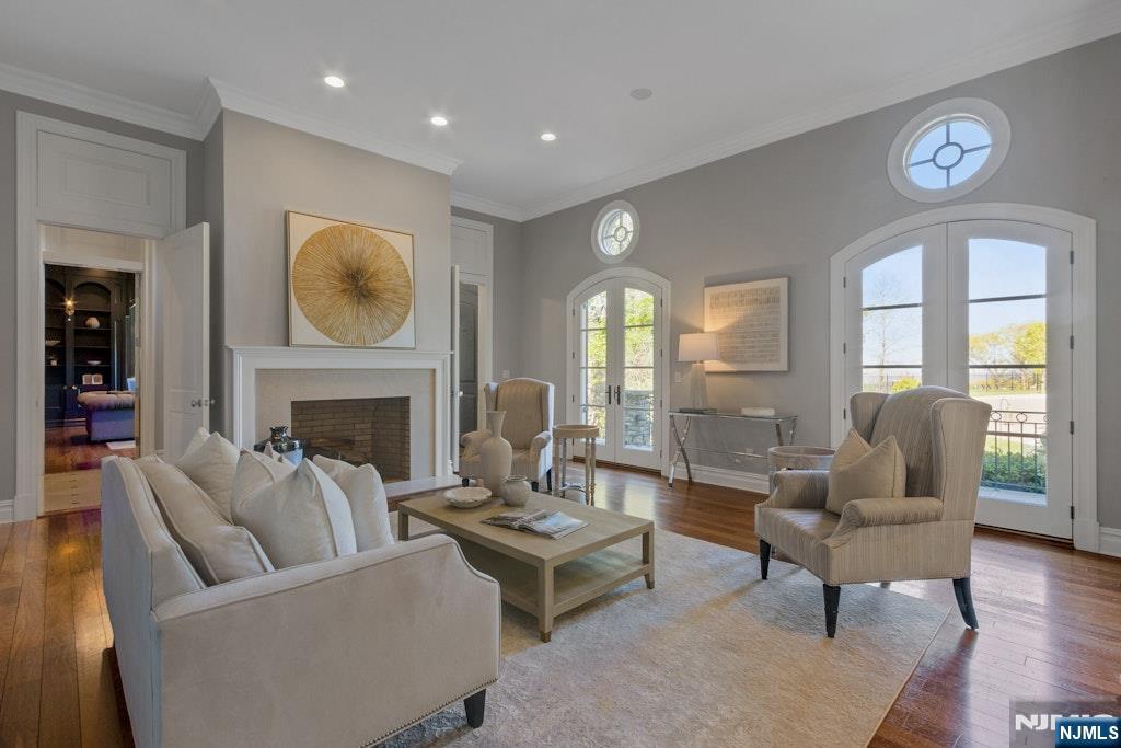19 Autumn Terrace Alpine, NJ 07620 - Photo 10 of 45 a living room with furniture and a fireplace