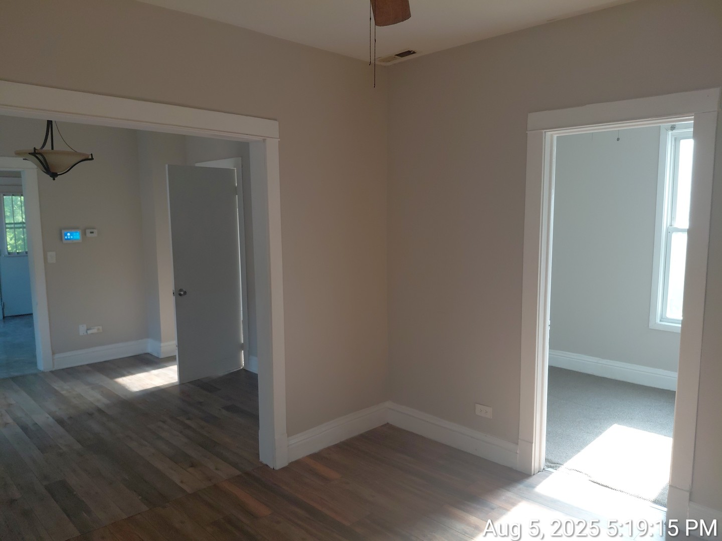 119 East 118th Street Chicago, IL 60628 - Photo 11 of 12 a view of a room with wooden floor
