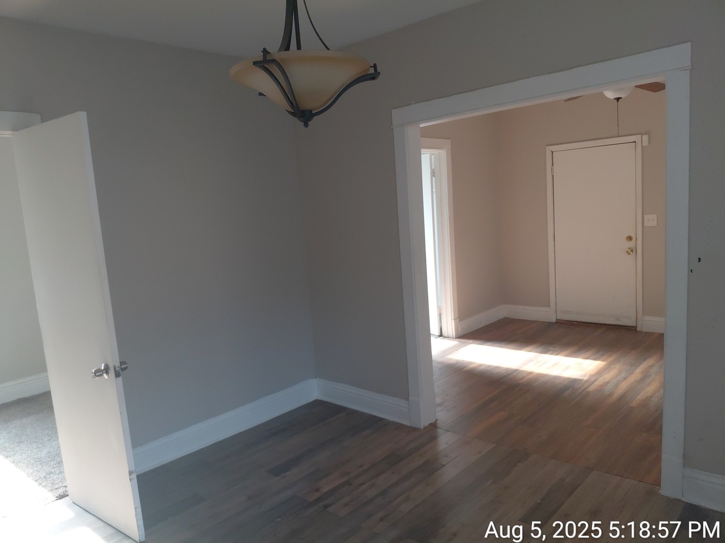 119 East 118th Street Chicago, IL 60628 - Photo 10 of 12 a view of empty room with wooden floor