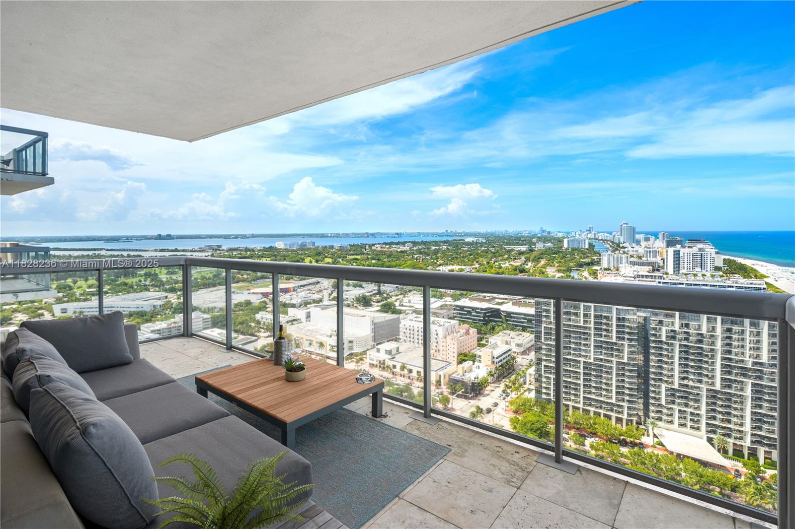 101 20th Street, Unit 3803 Miami Beach, FL 33139 - Photo 18 of 36 a balcony with city view