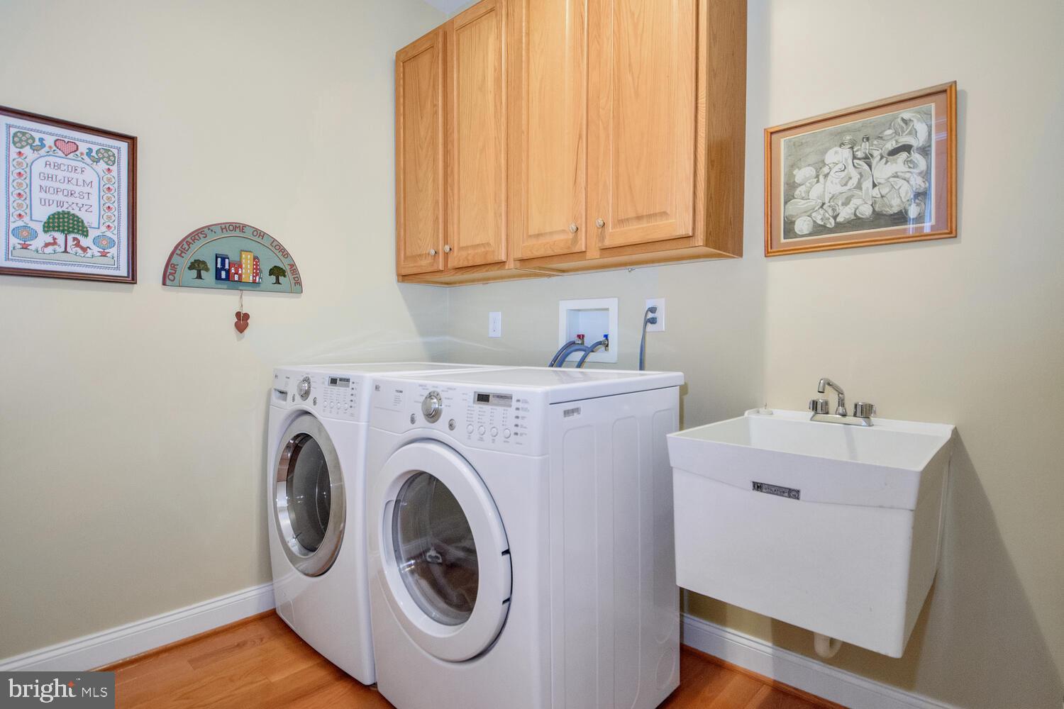 24 Sloan Road West Chester, PA 19382 - Photo 15 of 40 W&D, laundry sink and storage cabinets