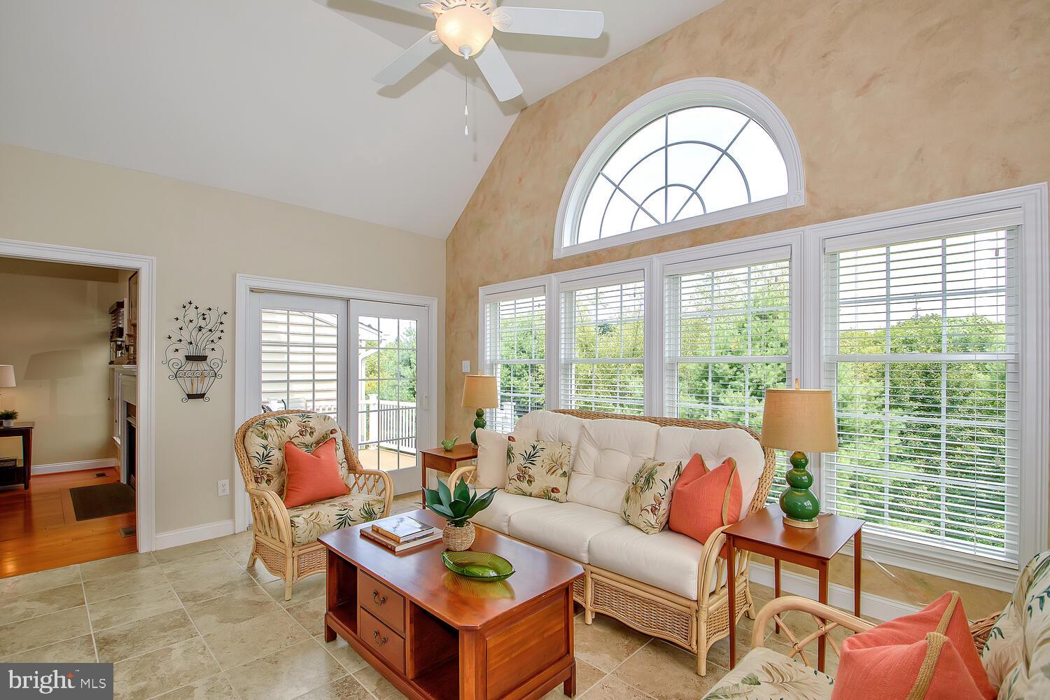 24 Sloan Road West Chester, PA 19382 - Photo 8 of 40 Sunroom with lofted ceiling and patio door to rear