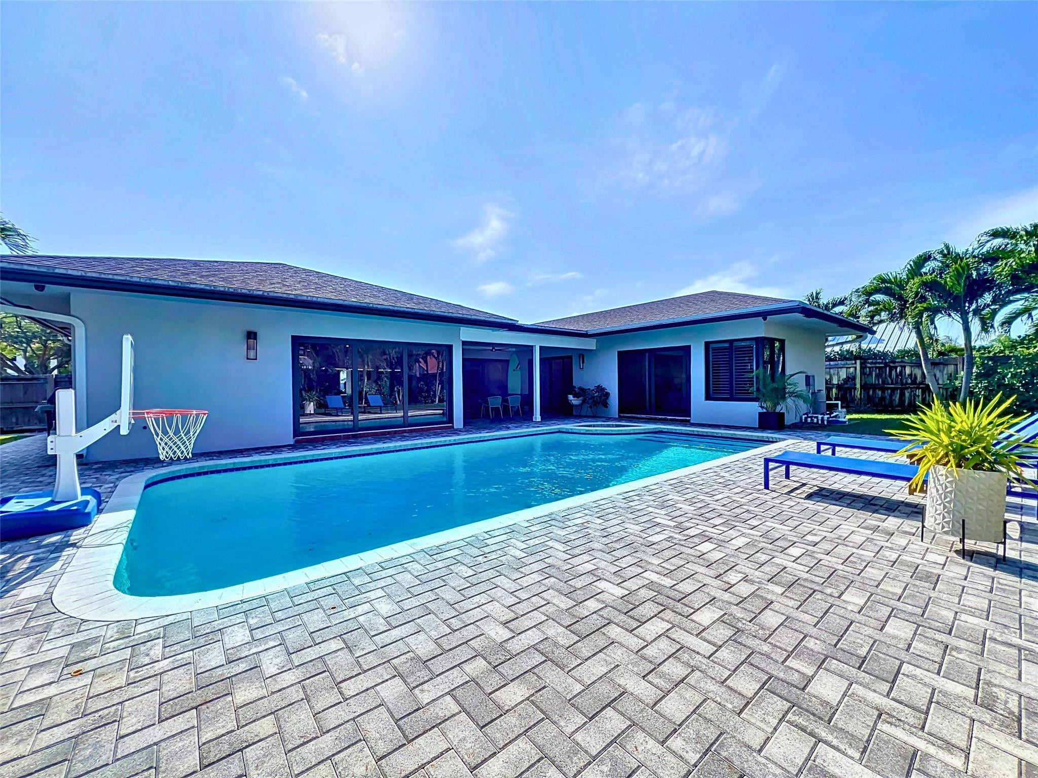 1501 Southwest 17th Street Boca Raton, FL 33486 - Photo 23 of 36 a view of house with swimming pool outdoor seating