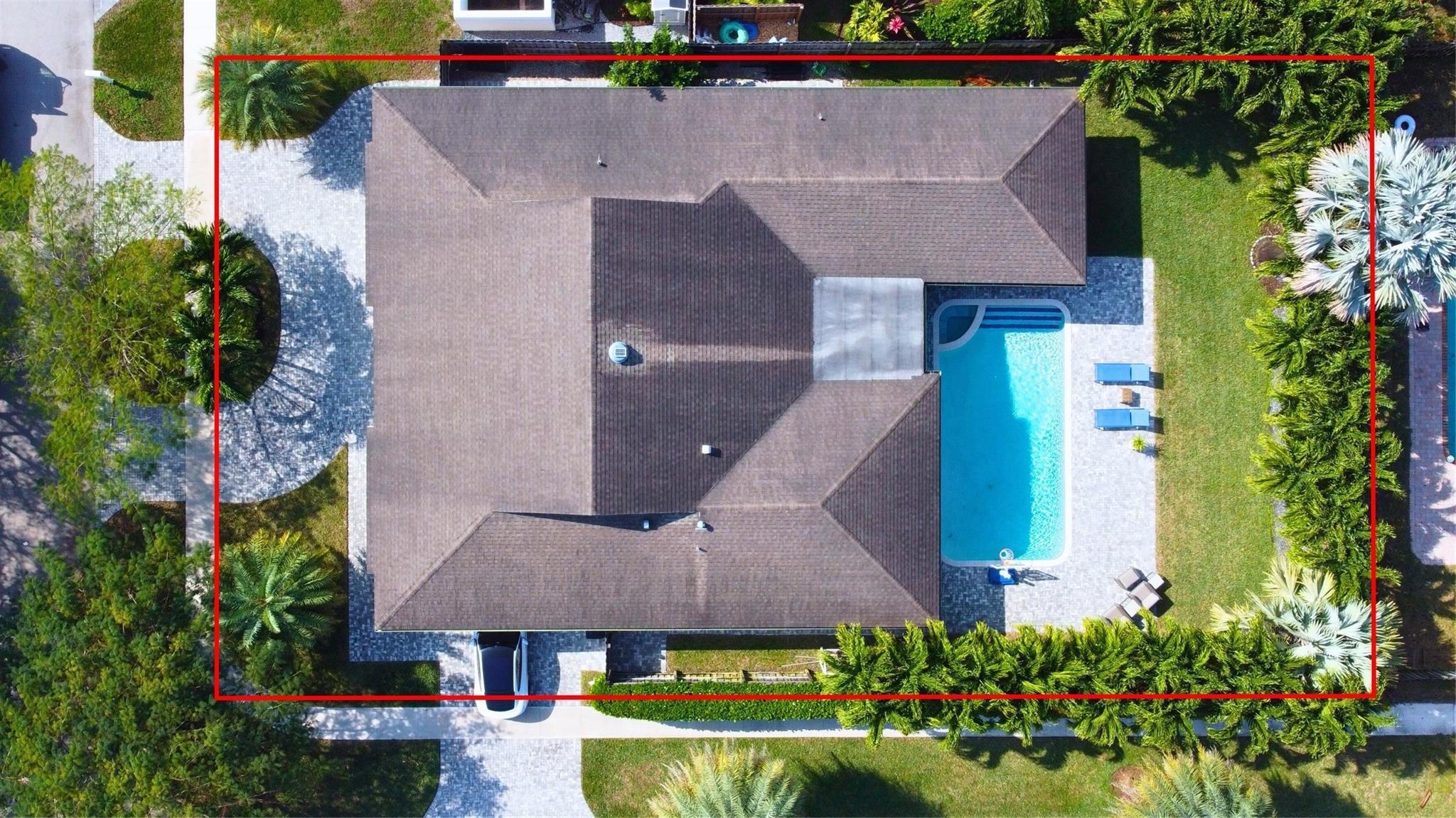 1501 Southwest 17th Street Boca Raton, FL 33486 - Photo 3 of 36 an aerial view of a house with a yard and a fountain