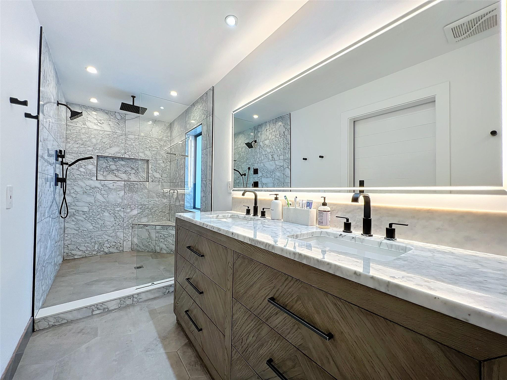 1501 Southwest 17th Street Boca Raton, FL 33486 - Photo 32 of 36 a bathroom with a granite countertop sink mirror and double