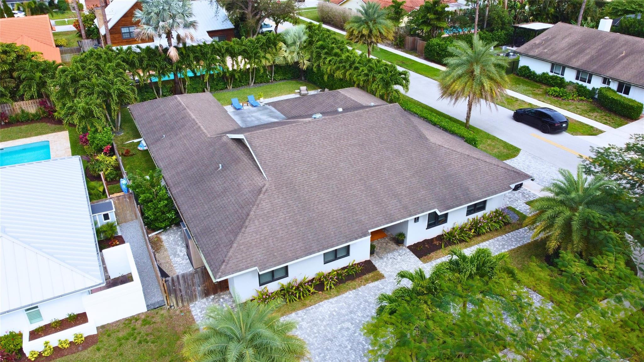 1501 Southwest 17th Street Boca Raton, FL 33486 - Photo 35 of 36 an aerial view of a house with a yard and lake view