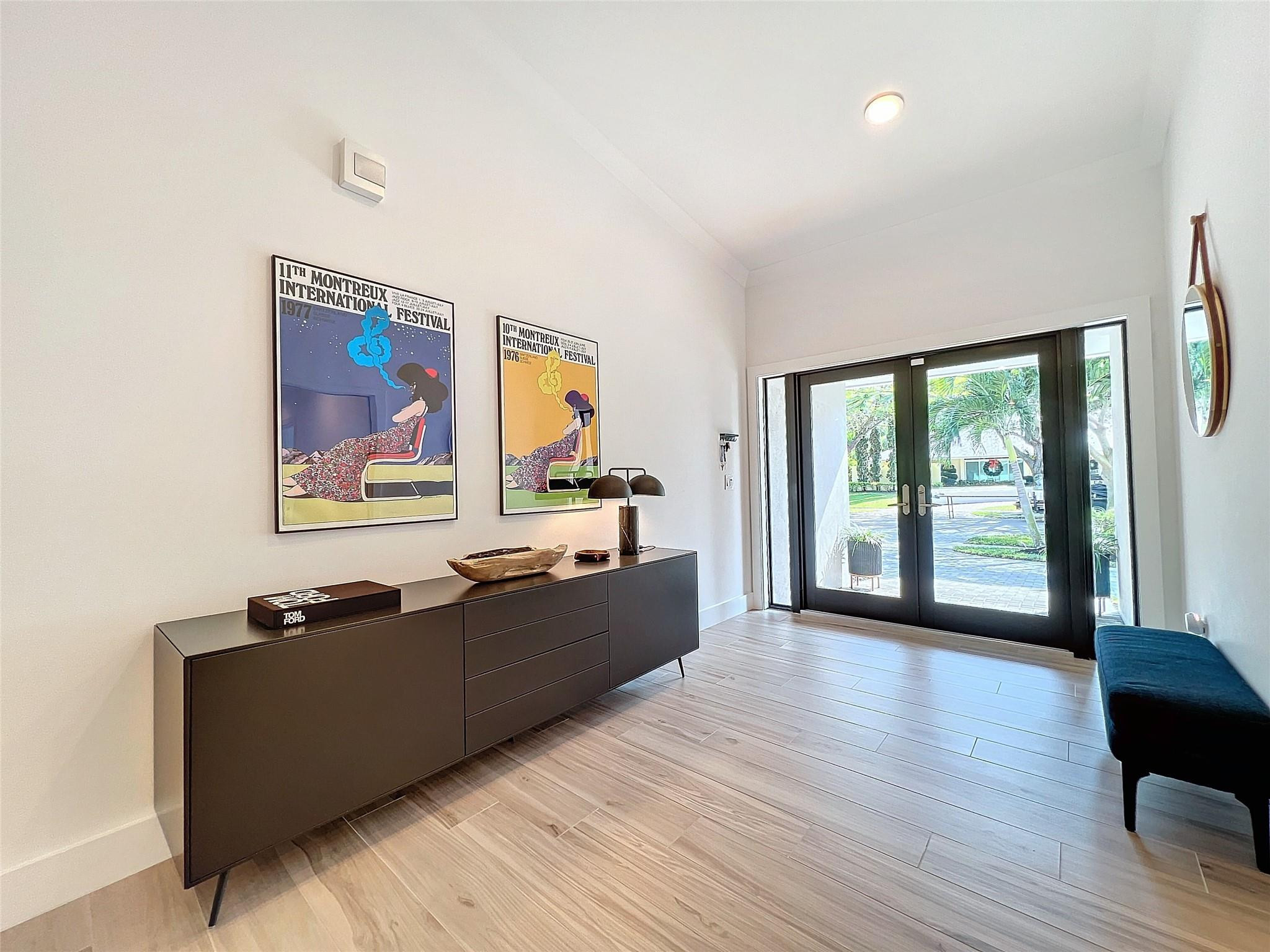 1501 Southwest 17th Street Boca Raton, FL 33486 - Photo 5 of 36 a living room with furniture and a flat screen tv