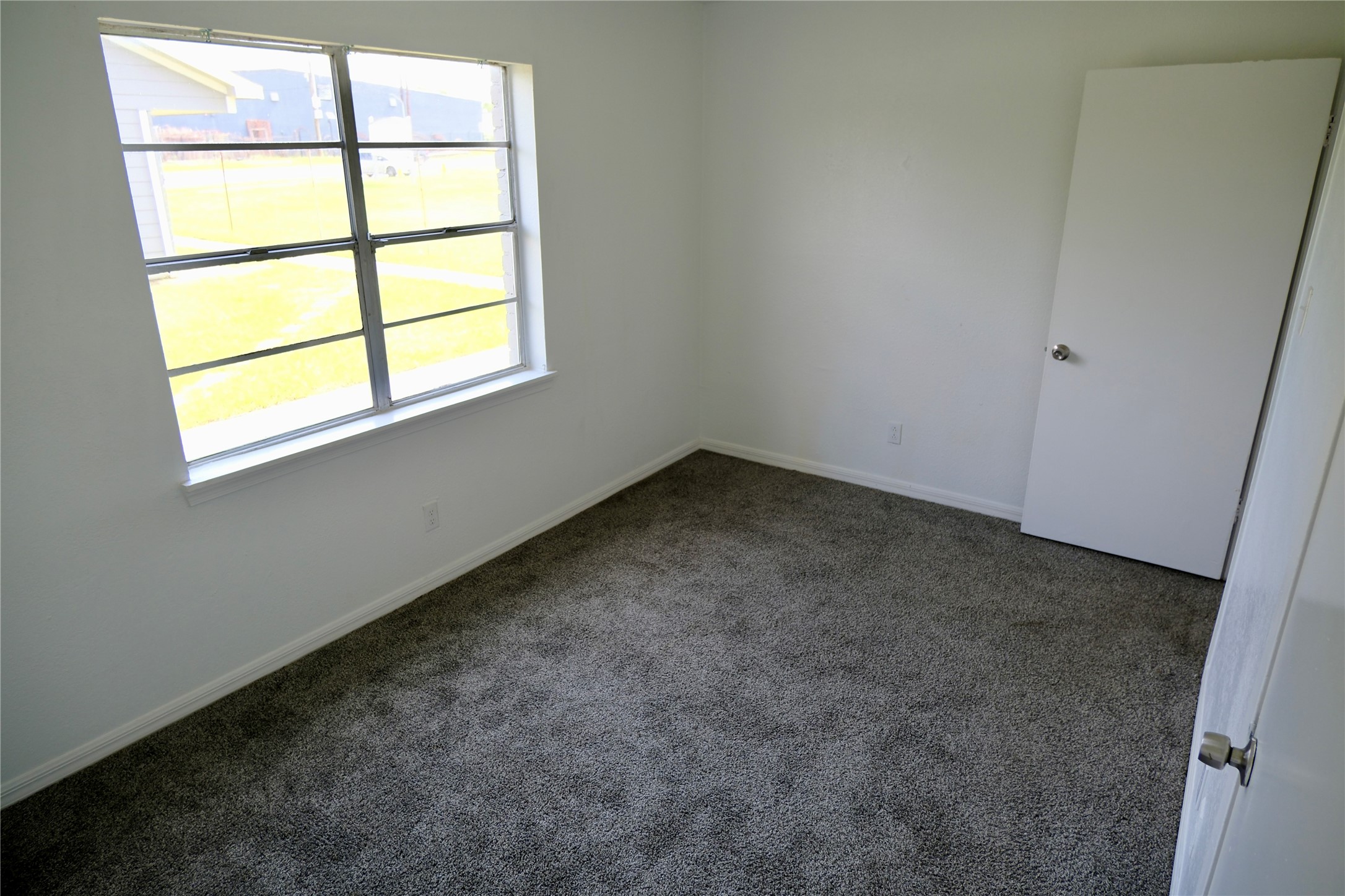 5602 Market Street, Unit 11 Houston, TX 77020 - Photo 20 of 29 Primary bedroom, Images are for illustrative purposes only and may represent a similar unit. Actual finishes, layout, and features may vary