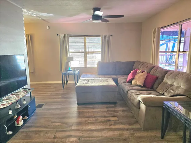 a bedroom with a bed and a table in it