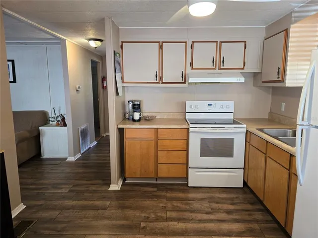 a view of balcony with outdoor seating and wooden floor