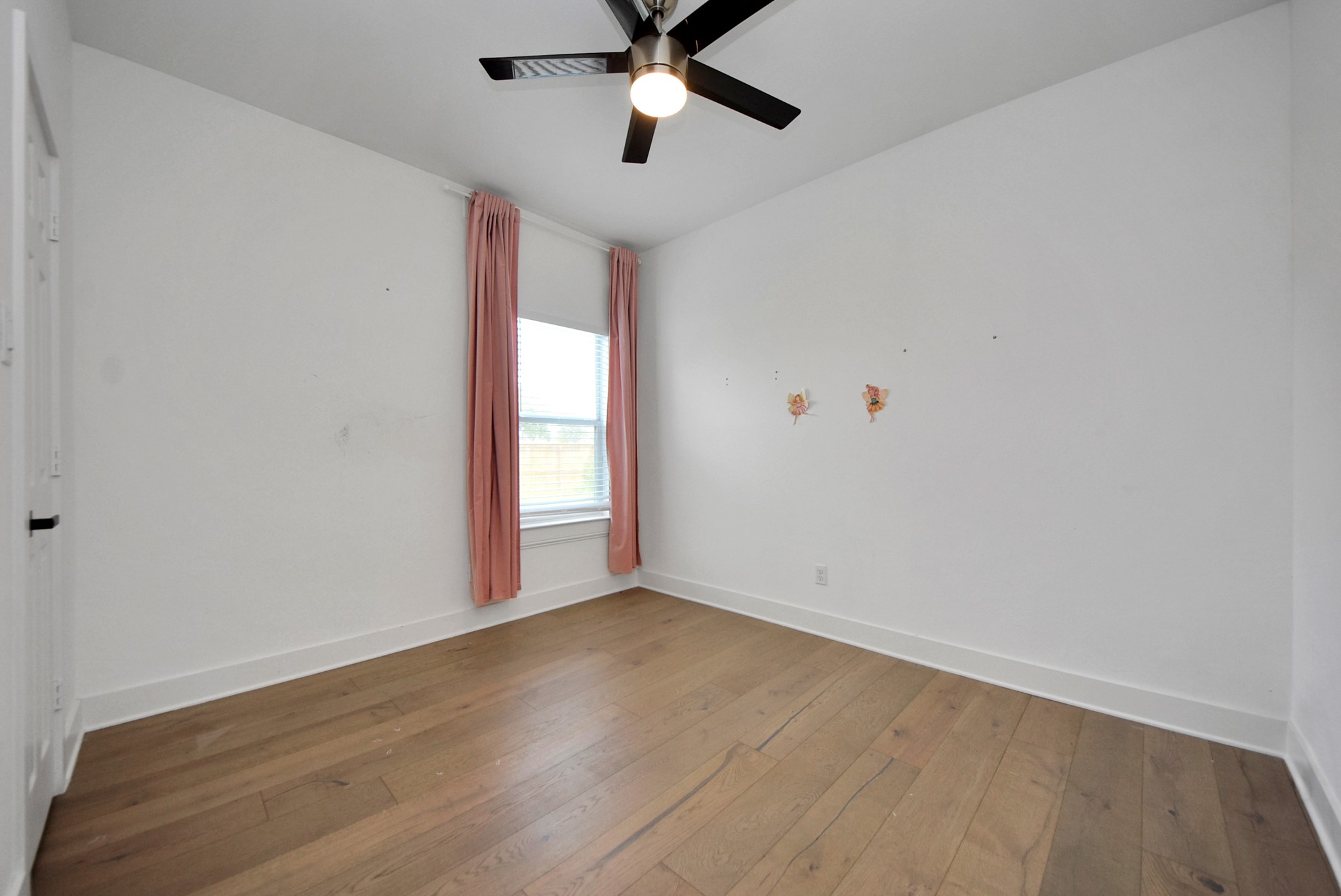 2311 Canfield Street Houston, TX 77004 - Photo 19 of 38 wooden floor in an empty room