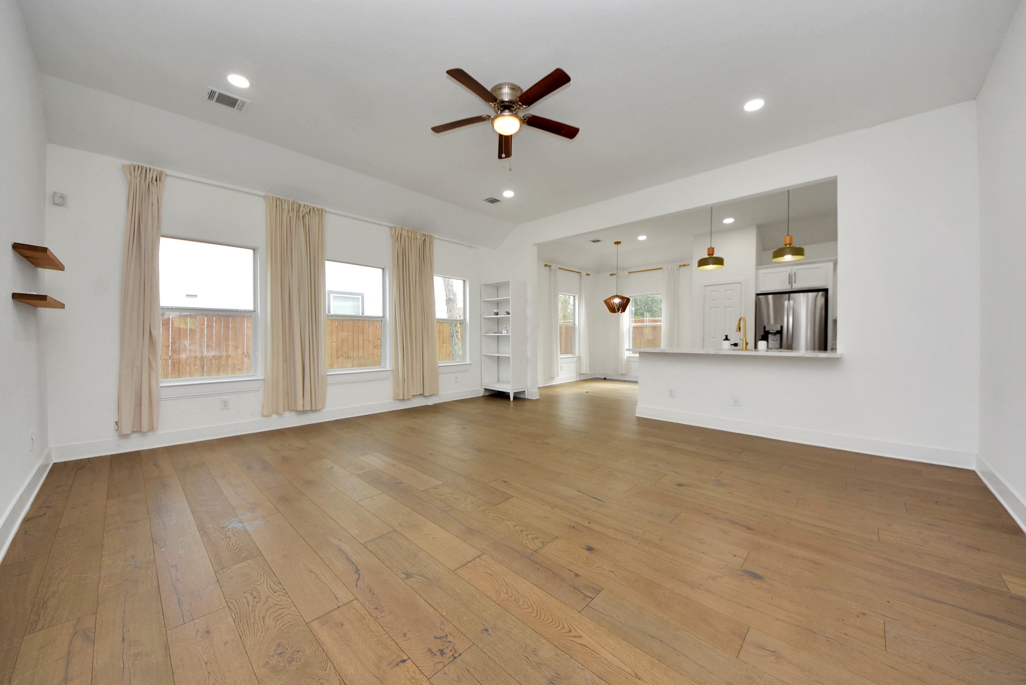 2311 Canfield Street Houston, TX 77004 - Photo 6 of 38 a view of an empty room with a window