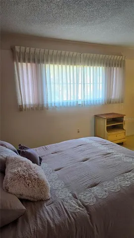 a bathroom with a double vanity sink and mirror