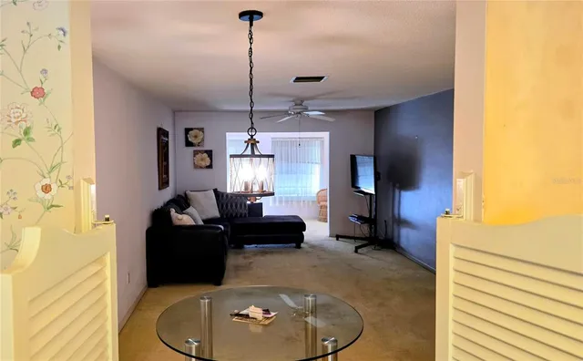 a view of a glass door and a window